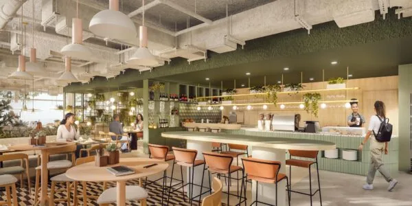 Moderne en sfeervolle koffiebar aan de Marten Meesweg met zitplaatsen, planten en een open balie.